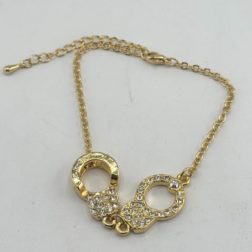 Rhinestone handcuff gold tone anklet